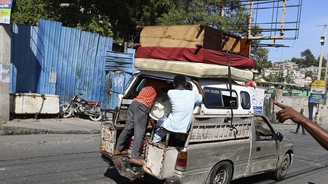 Residents of Haitian capital improvise for…