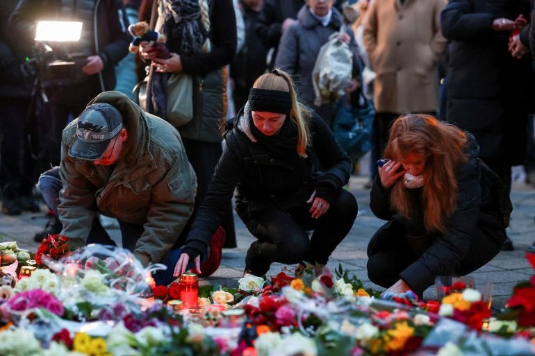 Germans mourn five people killed, 200 injured in Christmas market attack